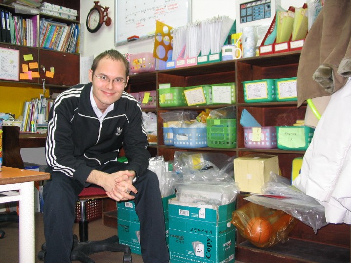 C'est moi in a self timer shot, surrounded my teaching paraphenalia, more facetiously known as 'terror aversion tactics'