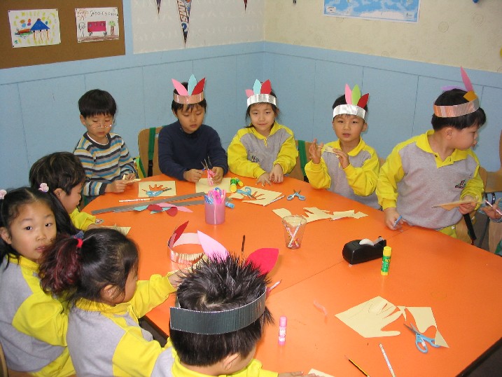 They had to trace their hands to make the turkey body but their hands were too small so they turned out to be rather scrawny turkies!!!