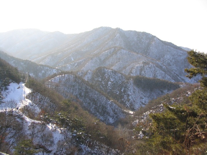 A view from the temple, facing the sun in the West, overlooking the Gamaksan range.