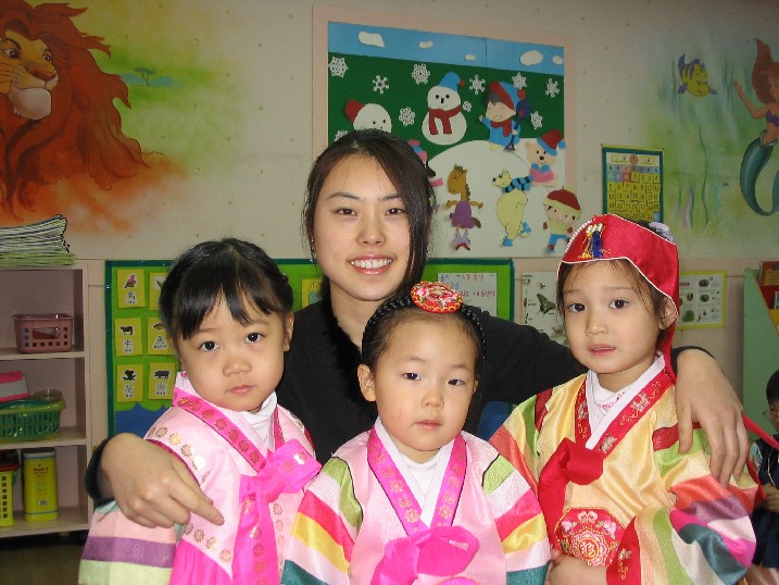 Kelly-teacher and Grace, Maria and Angela, the little four year old girls.
