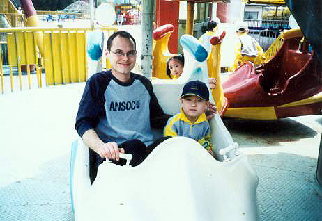 Korean kids never smile in photos - trust me, he's having a great time.